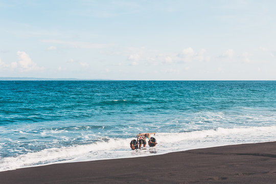 A woman makes kilos of salt every day in Bali, Indonesia