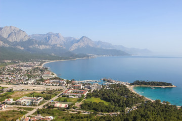 Fototapeta na wymiar High view of the city of Kemer in Turkey and the Mediterranean sea (moonlight Bay and port)