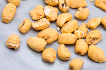 Roasted corn snack in a plate isolated