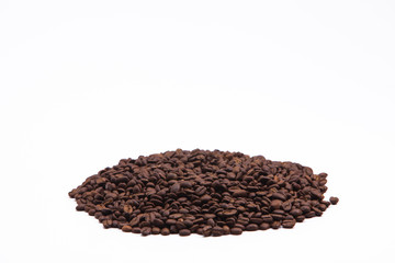 A group of roasted coffee beans isolated