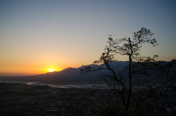 Fototapeta na wymiar Sunset behind the hills