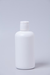 Empty white plastic bottle for wine