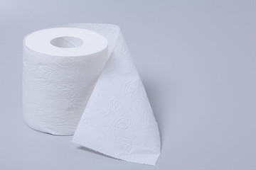 Toilet paper roll isolated on gray background