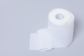 Toilet paper roll isolated on gray background