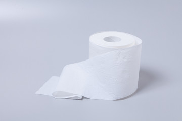 Toilet paper roll isolated on gray background