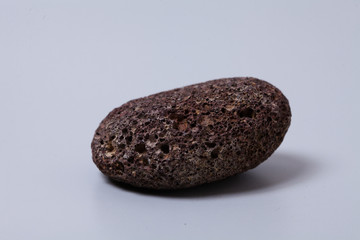  Volcanic rock on gray background