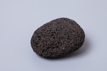  Volcanic rock on gray background