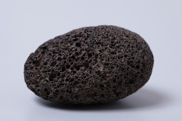  Volcanic rock on gray background