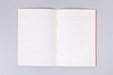  Sticky post note on open line note book 