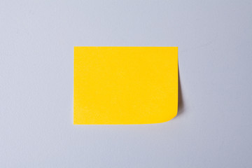 Blank sticky post note on gray background