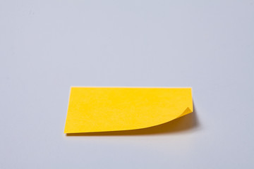 Blank sticky post note on gray background