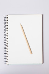 Pencil on blank note pad