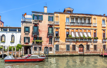 Old houses on Grand Canal, Venice, Italy. Vintage hotels or residential buildings in the Venice...