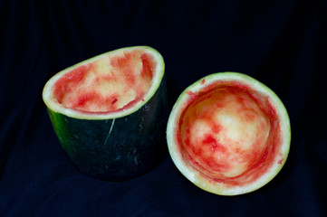 Empty watermelons two half on grungy background
