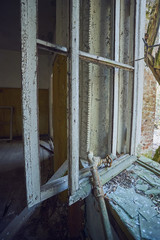 Abandoned house of culture inside in the village near the Chernobyl