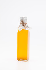 Perill oil in single glass bottle on white background