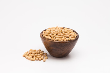  Soybean in wooden bowl on white background