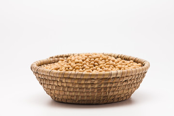 Fototapeta na wymiar Soybeans in basket isolated on white background