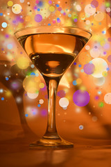 wineglass with festive background