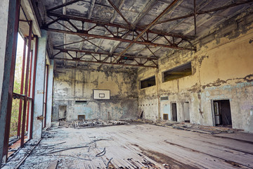 Abandoned school in Pripyat, Chernobyl zone. Abandoned gym.