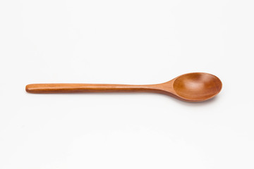 Wooden spoon isolated on white background