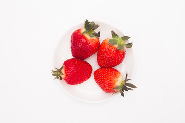 Fresh strawberry on white dish 