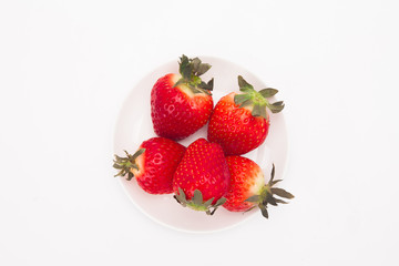  Fresh strawberry on white dish 
