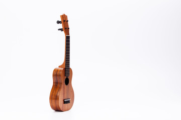 Fototapeta na wymiar The ukulele guitar isolated on white