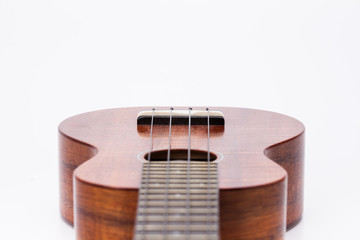 Obraz premium The ukulele guitar isolated on white (