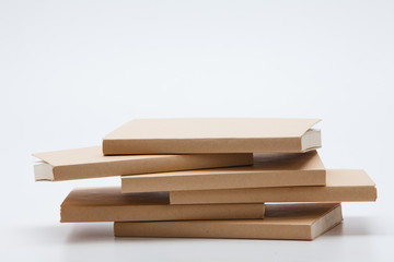  Stack of brown books isolated 