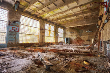 Fototapeta na wymiar Abandoned school in Pripyat, Chernobyl zone. Abandoned gym.