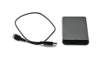 External hard drive for storing and transferring various files on a white background