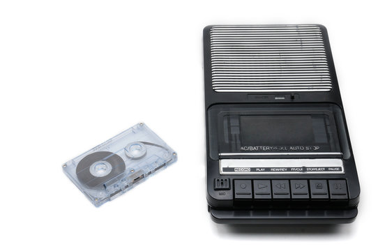 Old-time desktop type cassette recorder on white isolated background