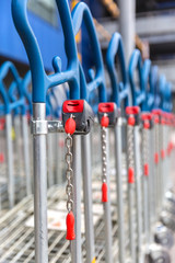  Neatly arranged coin-operated shopping carts, shopping malls