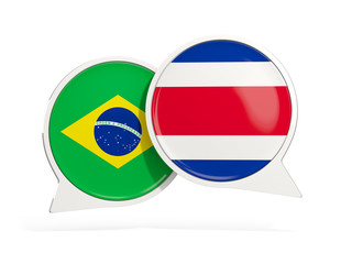 Fototapeta premium Flags of Brazil and costa rica inside chat bubbles
