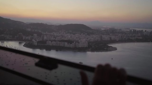 Slow Motion: Camera Gingerly Pokes Out of Sky Tram to Capture View of Rio - Rio de Janeiro, Brazil