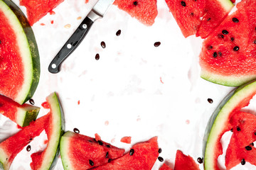 Red ripe sliced ​​watermelon on white background