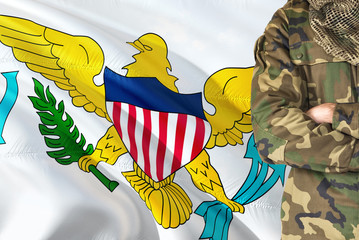 Crossed arms soldier with national waving flag on background - United States Virgin Islands Military theme.