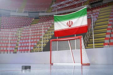 Flag of Iran in hockey arena with puck and net