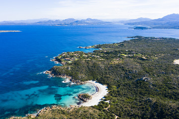 View from above, stunning aerial view of the Prince Beach (Spiaggia del Principe) bathed by a beautiful turquoise sea. Costa Smeralda (Emerald Coast) Sardinia, Italy.