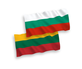 Obraz premium National vector fabric wave flags of Lithuania and Bulgaria isolated on white background. 1 to 2 proportion.