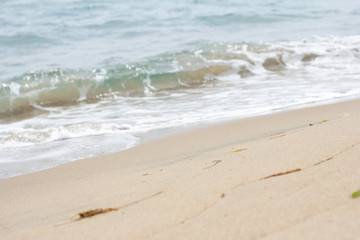 Fototapeta na wymiar blue sea, white beach and surf