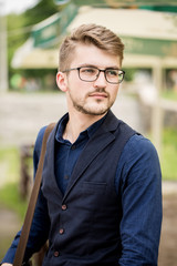 Obraz premium portrait of a young man with a bag