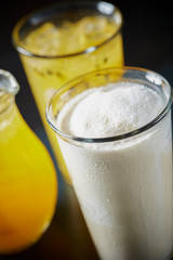 Fototapeta na wymiar Vanilla shake, passion fruit juice and orange juice