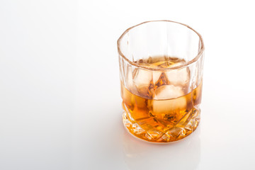 Whiskey with ice cubes.