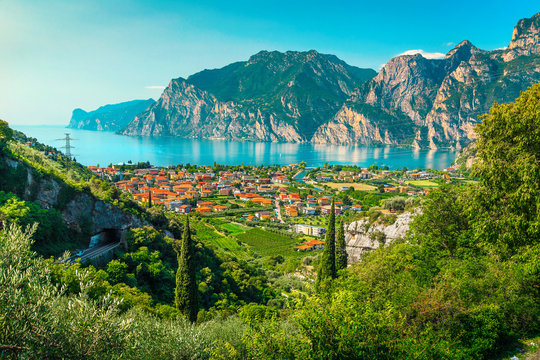 Lake Garda with high mountains and Torbole resort, Italy, Europe