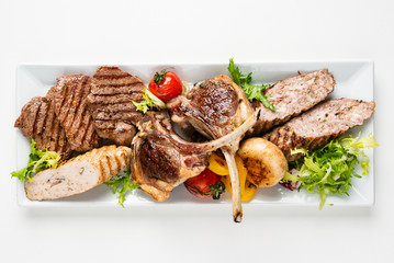 meat appetizer on the white plate
