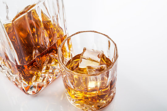 Glass and bottle of hard liquor scotch whisky