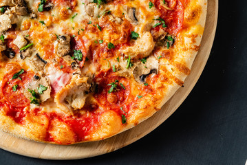 pizza on the black background
