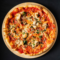 pizza on the black background